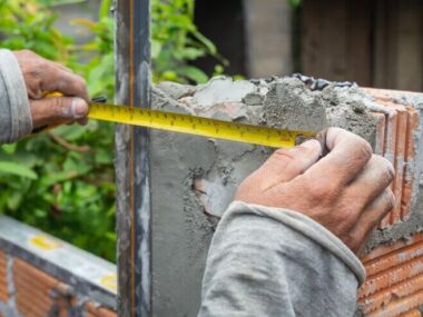 Bricklaying. Construction worker building a brick wall