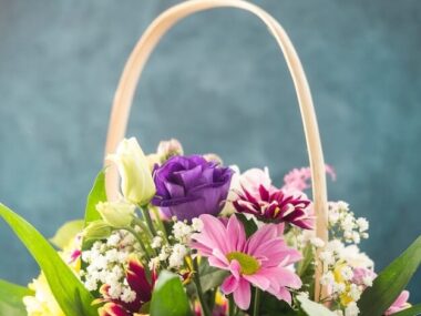 Fresh flowers bunch placed in wicker basket