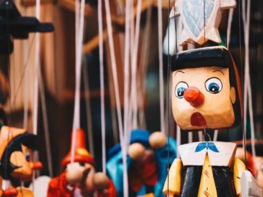 Wooden pinocchio doll with his long nose