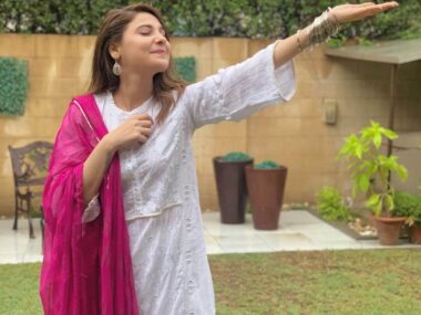 Happy Pakistan girl in Raining