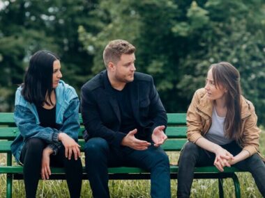 Three friend talking in park