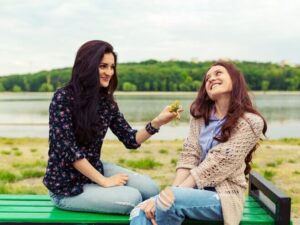 Two pretty sisters girls having fun together