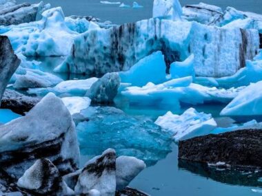 Majestic Iceberg Floating in Serene Waters