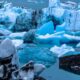 Majestic Iceberg Floating in Serene Waters