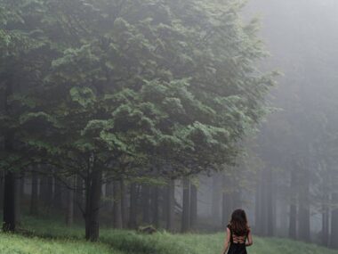 A girls walking on Misty path