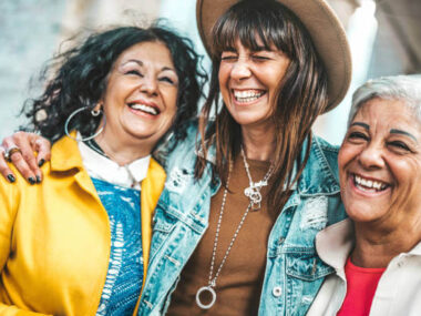 Three women together in happy mood