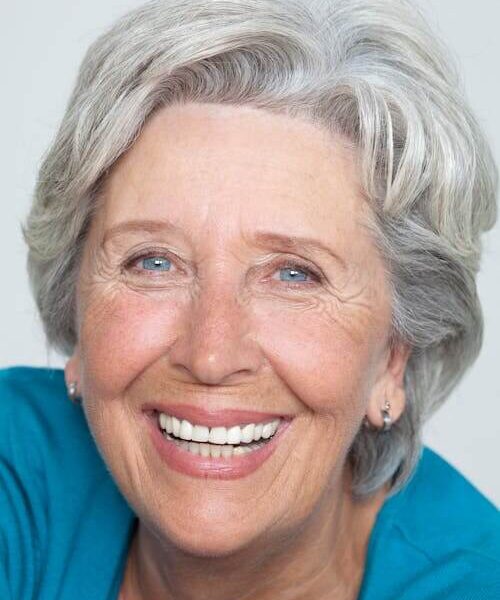 Portrait of Smiling Old Grey-Haired Woman