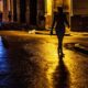 Silhouette Photo of Woman Walking on Road during