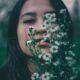 Woman Covered White and Green Flower