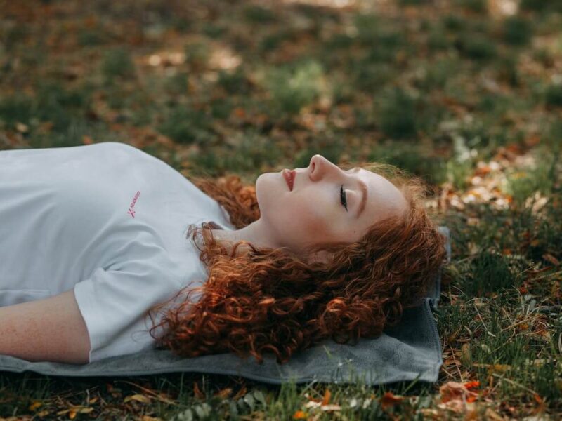 Photo Of Woman Laying On Ground