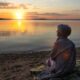 woman watching sunset