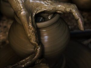 hoto Of Person Making Clay Pot