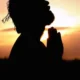 Silhouette Image of Person Praying