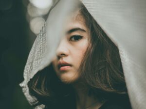 Selective Focus Photo of Woman Wearing Black Top
