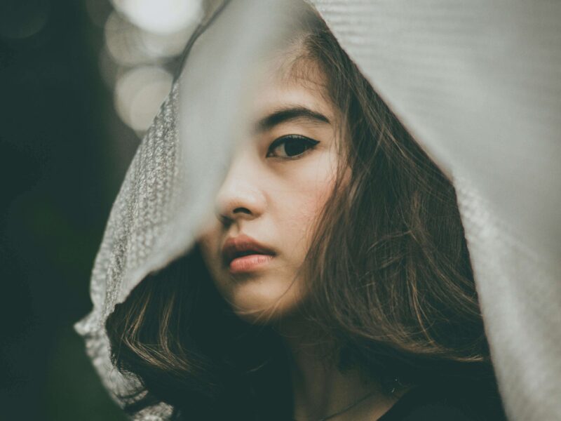 Selective Focus Photo of Woman Wearing Black Top