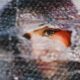 Captivating Eye Peeking Through Bubble Wrap