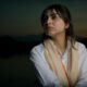 Brunette Woman in Shirt and Scarf